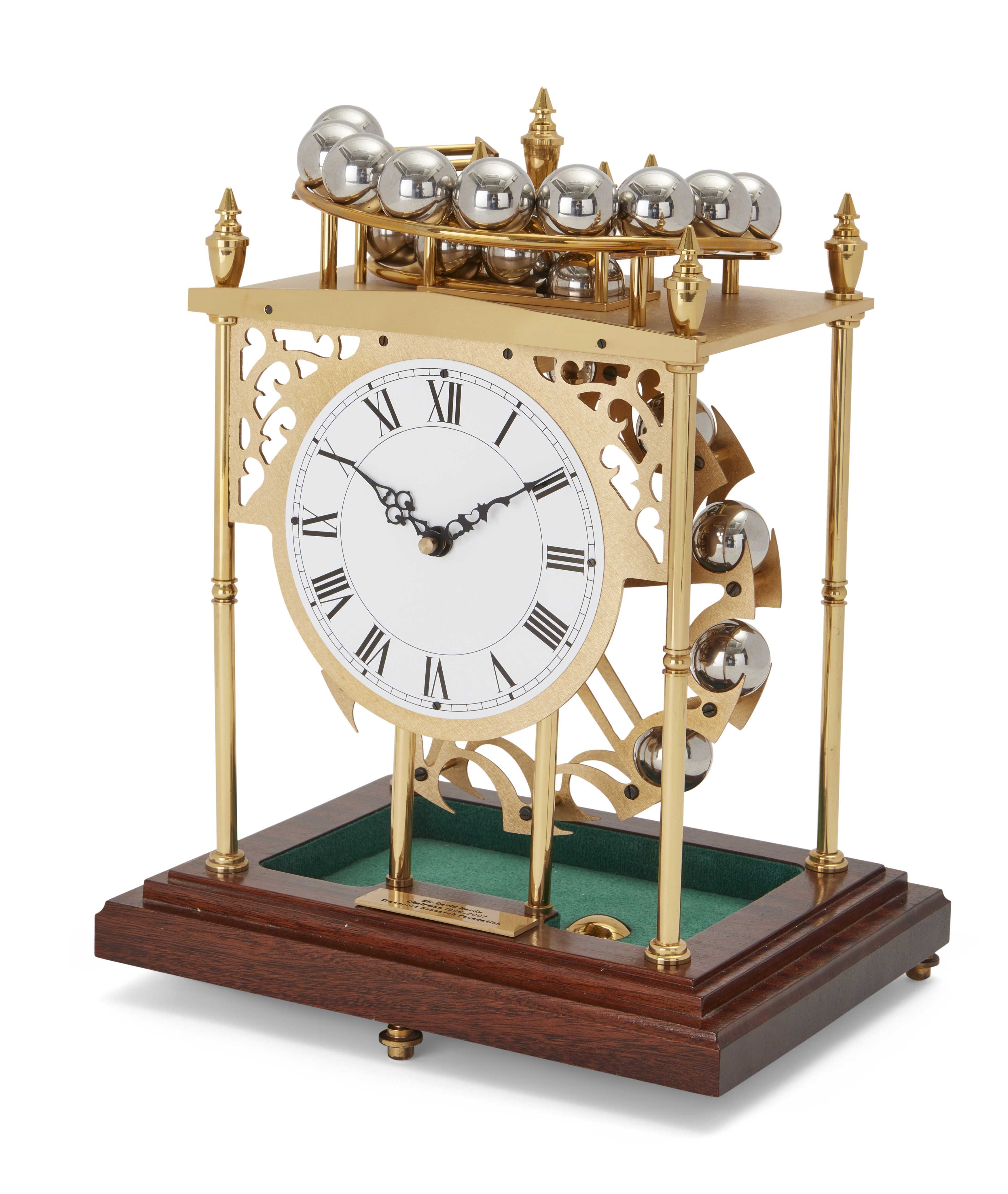 A modern spherical weight clock, the silvered dial with Roman numerals, the gilt-brass case with ...