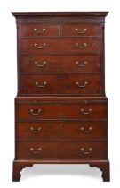 A George III mahogany chest-on-chest, last quarter 18th century, the dentil cornice above fret wo...