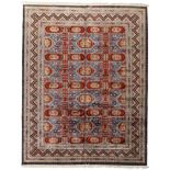 A modern Azerbaijani silk Shirvan carpet, signed, the central field with repeating geometric moti...