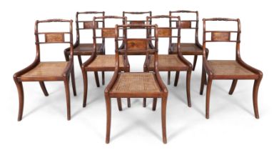 A matched set of eight Regency and later caned mahogany dining chairs, first quarter 19th century...