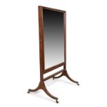 A George III mahogany cheval mirror, last quarter 18th century, the rectangular plate in reeded f...