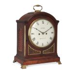 A Regency mahogany bracket clock, first quarter 19th century, the break-arch case with brass swin...