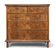 A William and Mary walnut feather banded chest, last quarter 17th century, two short and three lo...