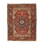 A Persian Heriz rug, second quarter 20th century, the central geometric floral medallion surround...