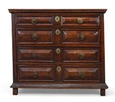 A William and Mary oak and walnut chest, last quarter 17th century, four drawers with cushioned f...