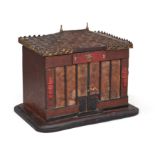 A French novelty oak tobacco box, c.1900, modelled as a Chinese shop, the lid formed as a pagoda ...