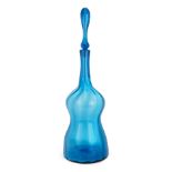 A large blue glass free-blown vase and stopper, mid to late 20th century, of bulbous form with he...