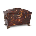 A late Regency tortoiseshell tea caddy, first quarter 19th century, of sarcophagus form, the top ...