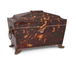 A late Regency tortoiseshell tea caddy, first quarter 19th century, of sarcophagus form, the top ...