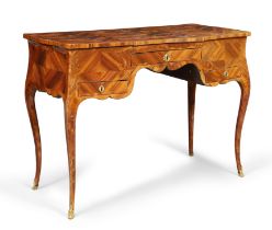 A Louis XV tulipwood, bois satine and fruitwood marquetry writing table, third quarter 18th centu...