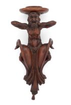 An Italian walnut wall bracket, late 19th century, modelled as a fawn with expressive face, 51cm ...