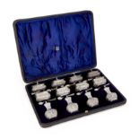 A cased set of silver cruets by Colen Hewer Cheshire, in fitted case, the set comprising: four sa...