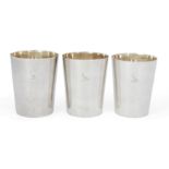 A set of three George III silver stacking beakers, London, one 1793 and two 1794, maker's mark W....