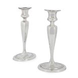 Tiffany & Co. A pair of American silver candlesticks by Tiffany & Co., c.1910, stamped sterling, ...