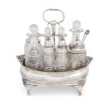 A George III silver cruet set, London, 1811, Charles Chesterman II, the stand with gadrooned bord...
