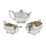 A George III silver three piece tea set, London, 1809, Daniel Pontifex, designed with decorative ...