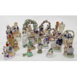 A group of Staffordshire ceramic figures and figure groups, 19th century, comprising: a figure gr...