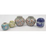 A group of Chinese porcelain, 20th century, comprising: a pair of famille rose cloud and bats jar...