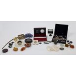 A group of collectibles and accessories, to include a selection of coins including a Sardinian 1 ...