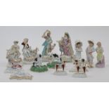 A collection of British porcelain figures, 18th - 20th centuries, to include a pair of Duesbury &...