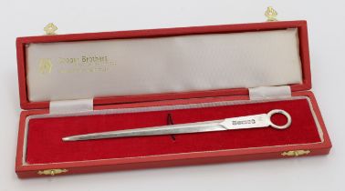 A silver paper knife, Sheffield, 1977, Cooper Brothers & Sons Ltd, designed as a meat skewer, in ...