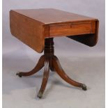 A Regency mahogany pembroke table, first quarter 19th century, single drawer on ring turned colum...