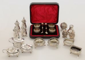 A group of various silver cruets, comprising: two Victorian open salts, Sheffield, 1894, Martin, ...