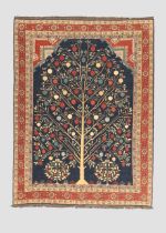 A Persian Soumak flatweave carpet, the central field with geometric fruit tree design, on a blue ...