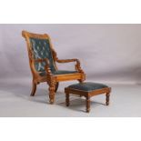 An Indonesian carved button back arm chair and stool, William IV style, 20th century (2)