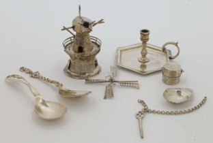 A mixed group of silver oddments, comprising: a Georg Jensen spoon, stamped 925 and marked STERLI...