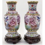 A pair of Chinese cloisonné enamel 'peonies' vases, 20th century, each of baluster form, enamelle...