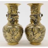 A pair of Chinese bronze dragon vases, Republic period, each with a globular lower body decorated...