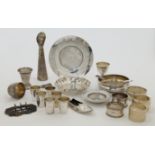 A group of silver and white metal oddments, comprising: an Edwardian silver dish, Sheffield, 1904...