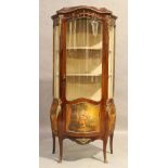 A French mahogany vitrine, Louis XV style, second quarter 20th century, gilt metal mounted, with ...