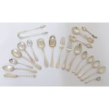 A mixed group of silver flatware, including: a pair of Georgian sugar tongs, 1815, maker's mark r...