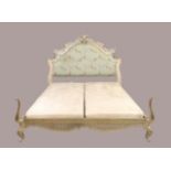 A Versailles leafed king size bed from 'And so to bed', with silver leaf finish, 172cm high, 204c...