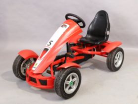 A Ferrari FXX pedal car by Berg toys Provenance: Property From the Collection of Kartika Soekarno
