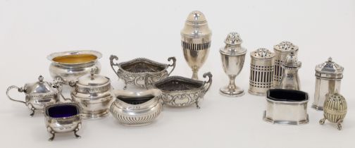 A group of silver cruets, comprising: a Victorian open salt, Birmingham, 1897, maker JH, the half...