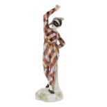A Paris (Samson) porcelain figure of Harlequin, early 20th century, polychrome painted in the Mei...