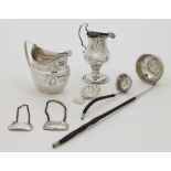 A small group of Georgian silver, comprising: a George III caddie spoon, 1797, Peter & Ann Batema...