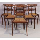 A set of six Regency rosewood bar back dining chairs, first quarter 19th century, with caned seat...