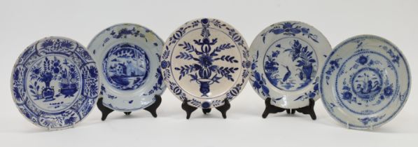 A group of Dutch Delft ware blue and white ceramic plates, 18th century, to include an example de...