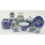 A group of Chinese blue and white vessels, 20th century, comprising two jars and covers, 20cm and...