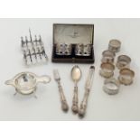 A small group of silver, comprising: a Victorian Christening set of a knife, fork and spoon, the ...