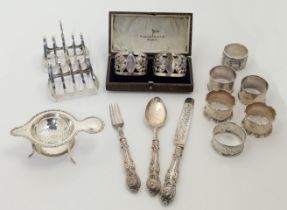 A small group of silver, comprising: a Victorian Christening set of a knife, fork and spoon, the ...