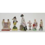 A group of English ceramic figures, 19th century, to include a Staffordshire pearlware figure emb...