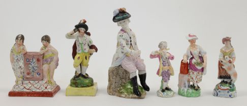 A group of English ceramic figures, 19th century, to include a Staffordshire pearlware figure emb...