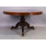 A Victorian rosewood breakfast table, third quarter 19th century, the circular tilt top above car...