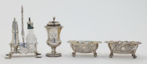 A small group of silver, comprising: an urn-shaped Georgian silver pepperette, London, Rebecca Em...