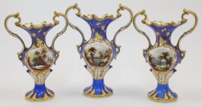 A garniture of three Coalport porcelain twin handled vases, c.1840, each of blue ground with cent...